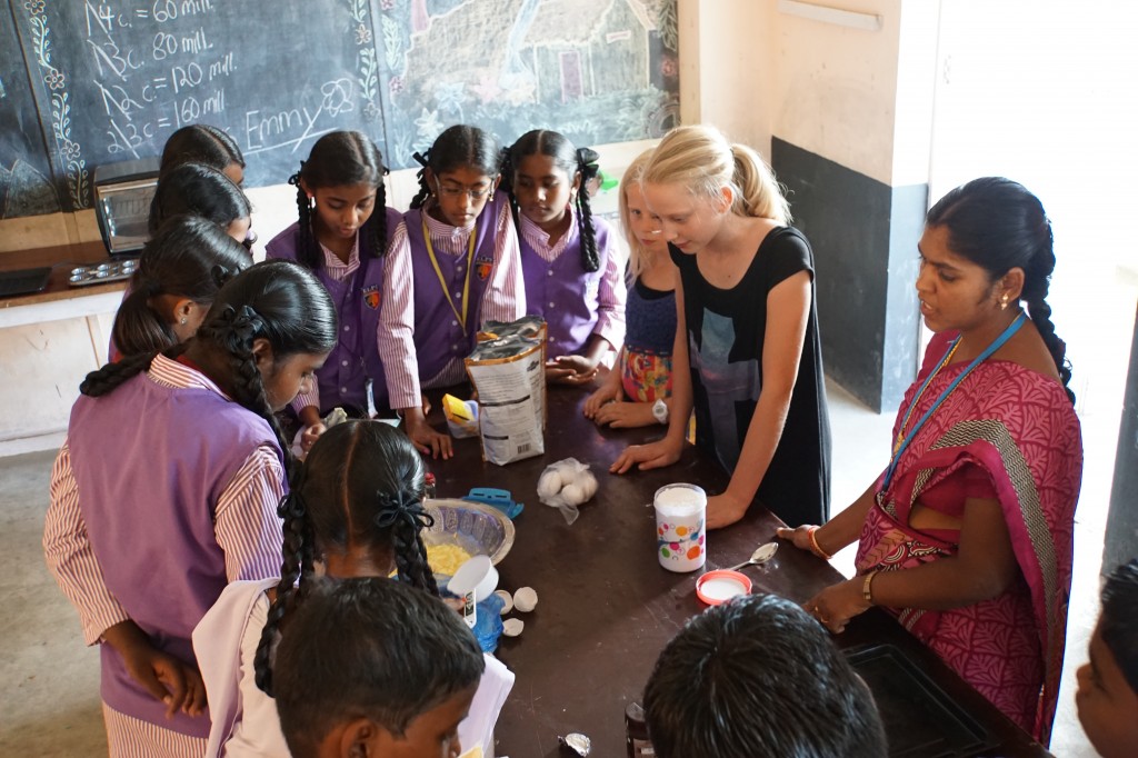 Emmy taught the school baking club how to make chocolate chip cookies. This was the first time any of these children had tasted chocolate chips. We brought several bags with us just for this class.